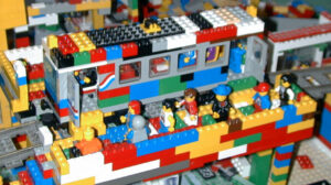 Colored Lego train stopped at the station